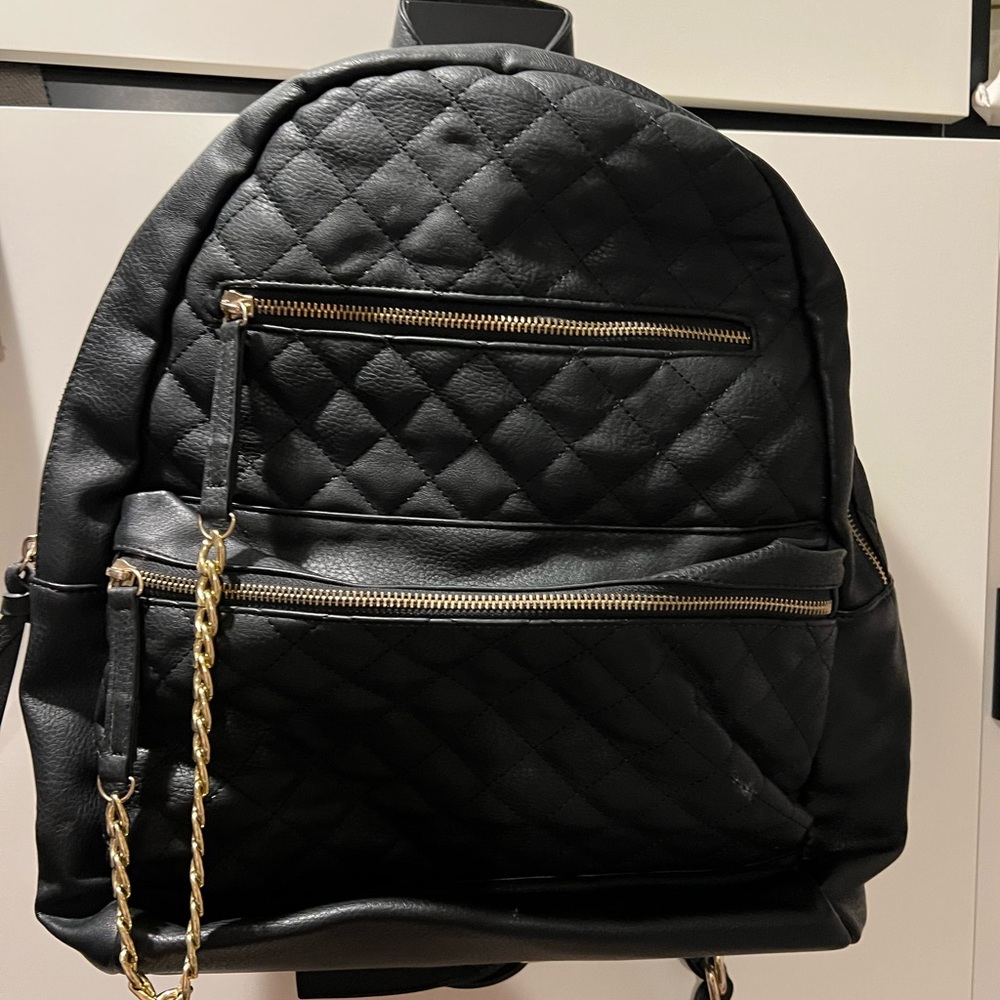 Black call it spring backpack with chain